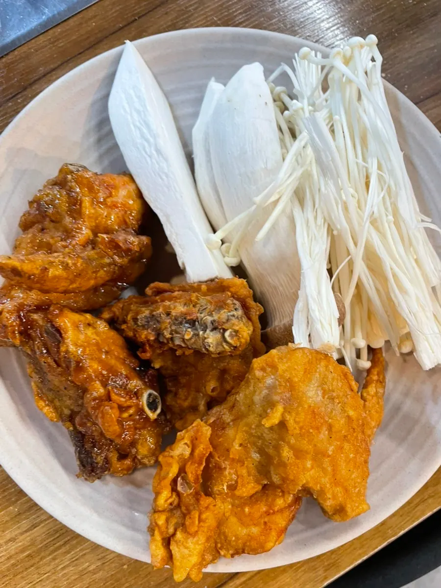 Chicken enjoyed with draft beer
