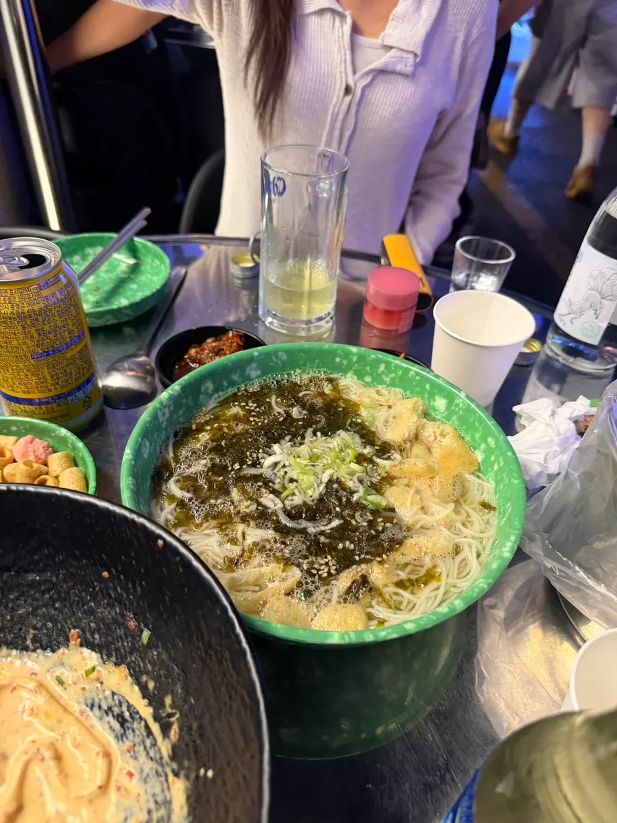Squishy-toy prize machine and an order of janchi guksu