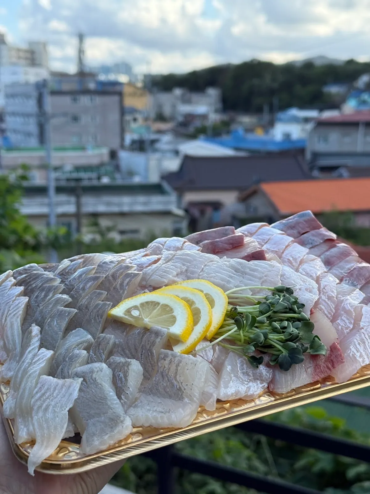 Sashimi takeout packed with ice packs and an insulated bag