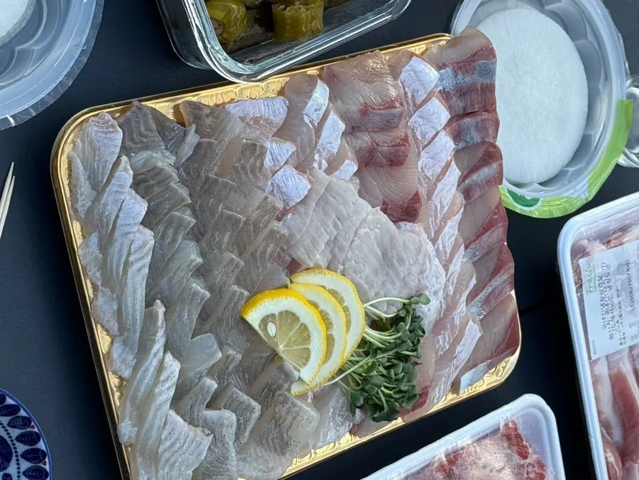 Assorted sashimi served with sea snails and meat