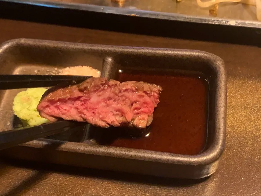 Wagyu and shrimp dipped in the special sauce