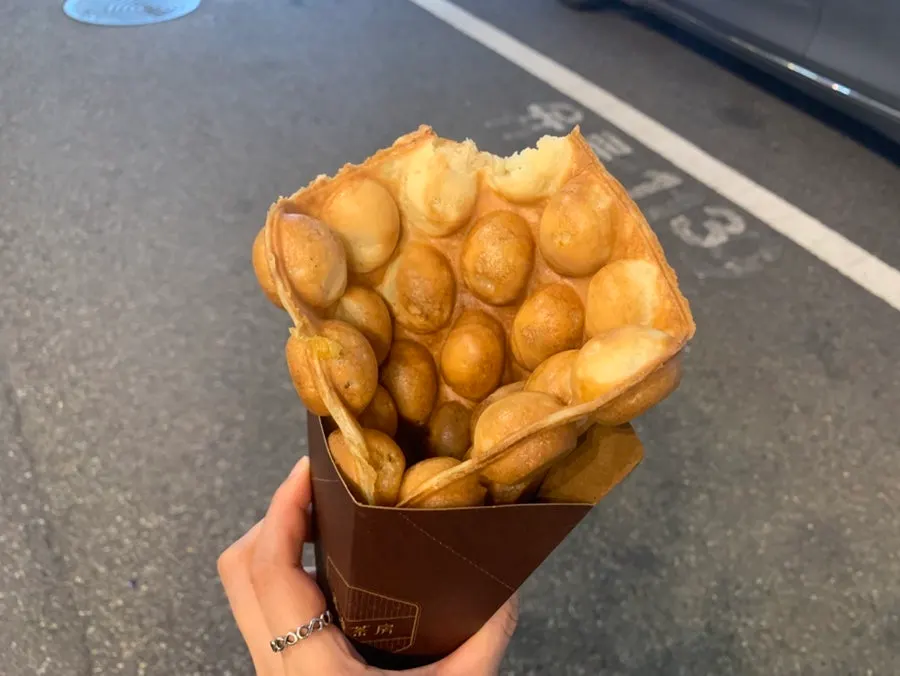 Sweet potato flavored Hong Kong waffle eaten for dessert