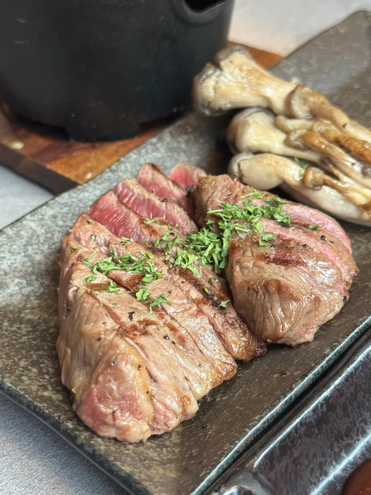 A plate of sliced fan-shaped steak