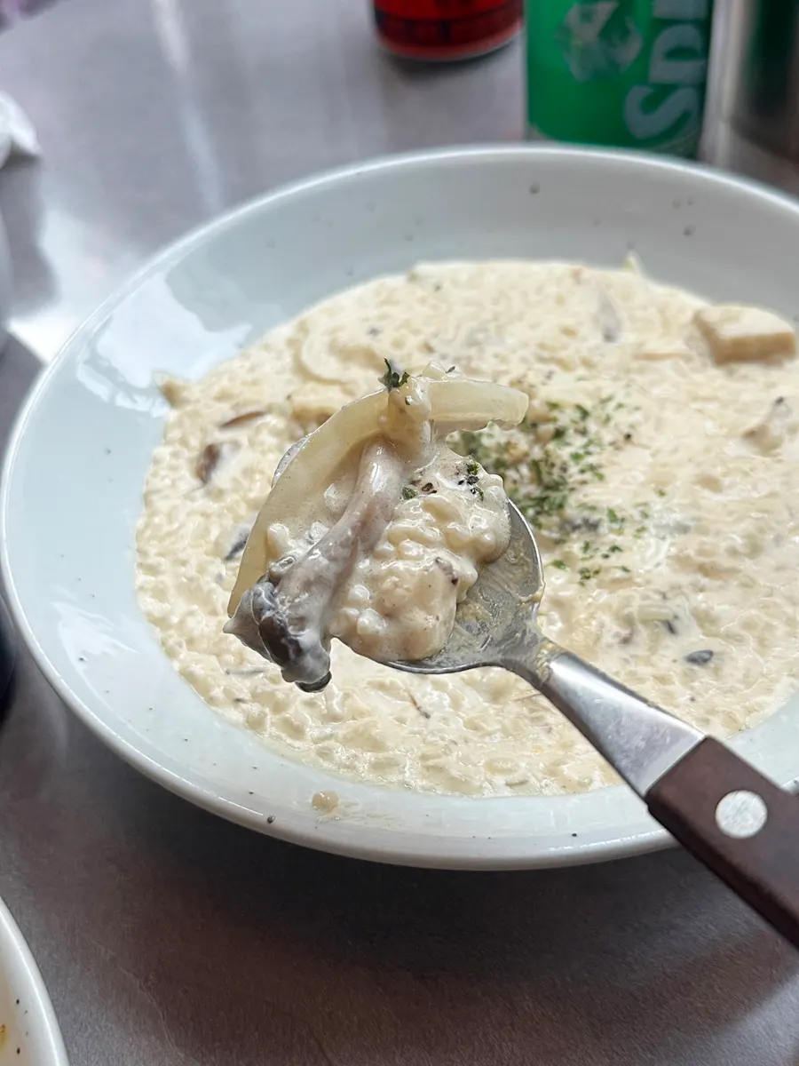 A spoonful of cream risotto