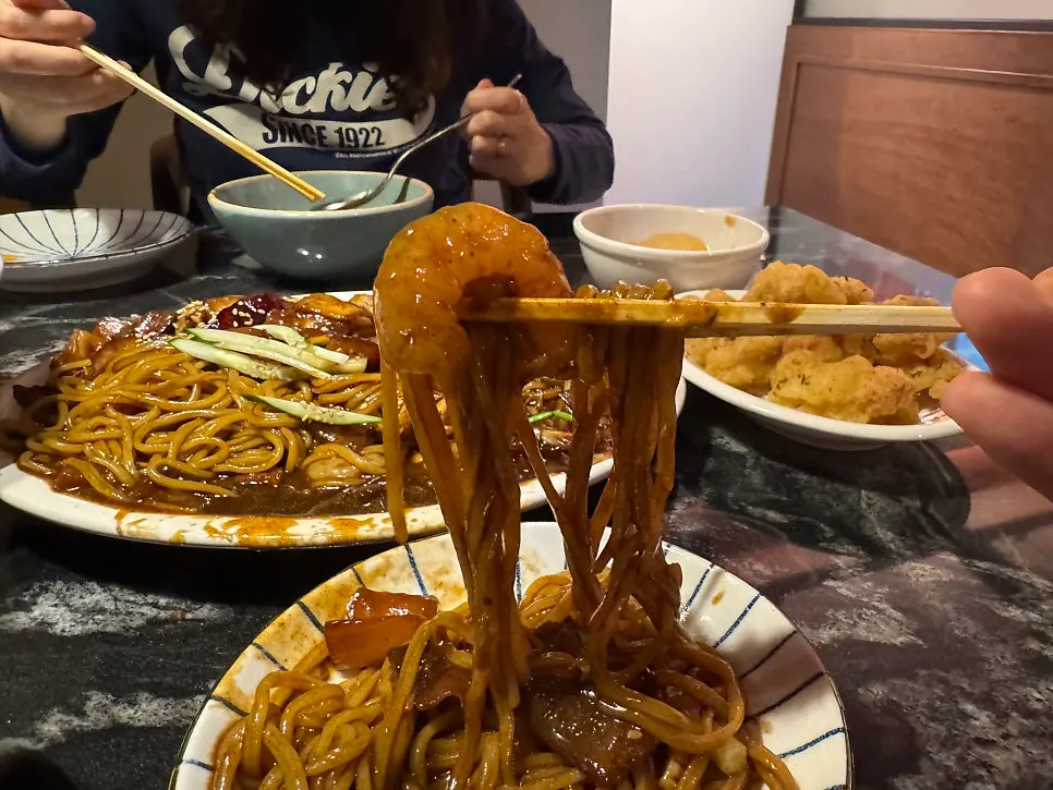 Meat jjamppong eaten alongside the jjajang platter