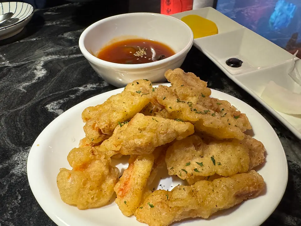 Three Chinese dishes shared between two people