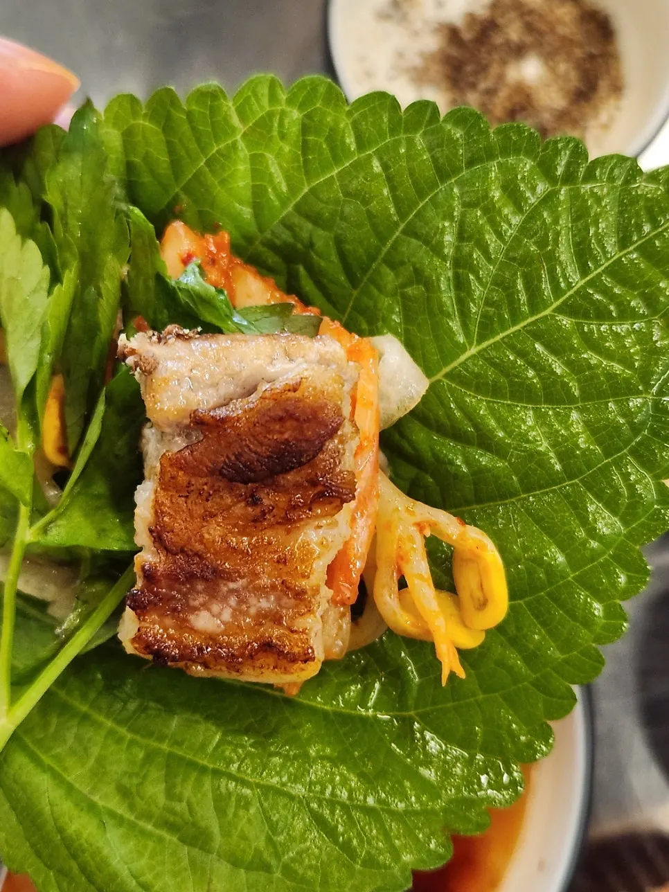 Sweet pumpkin grilled in pork fat alongside pork belly