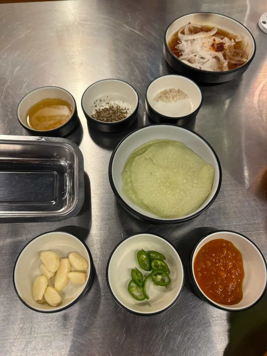 Generous table spread of basic side dishes