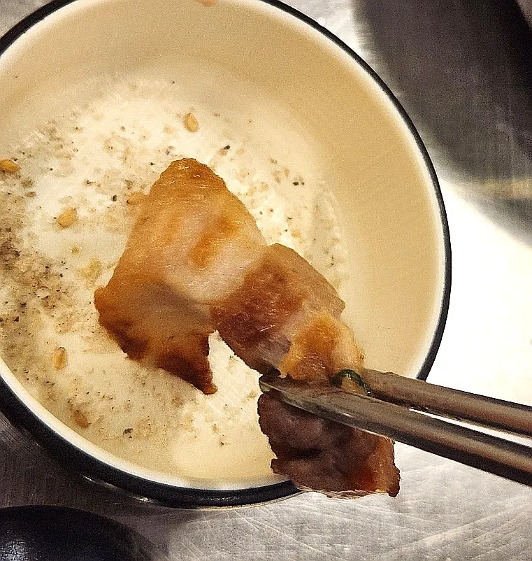 A well-cooked piece of fresh pork belly
