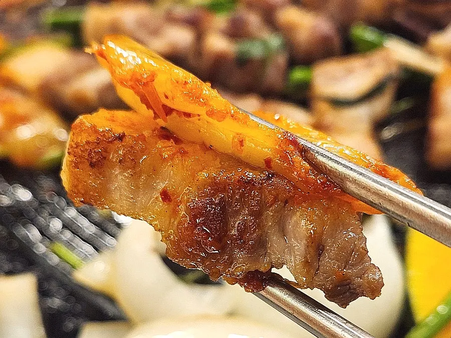 Sweet pumpkin and kimchi grilled in pork fat