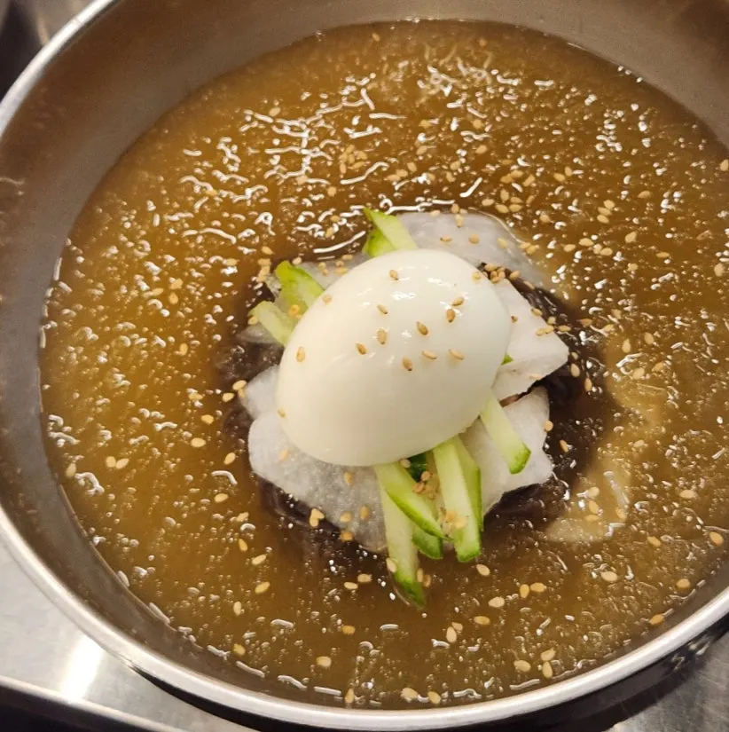 A bowl of mul-naengmyeon (cold noodle soup)