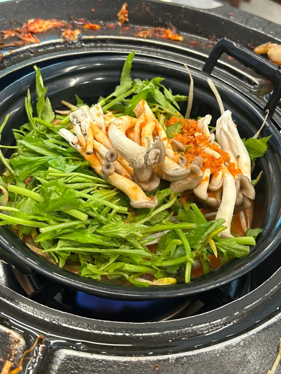 A bite-sized pork belly wrap