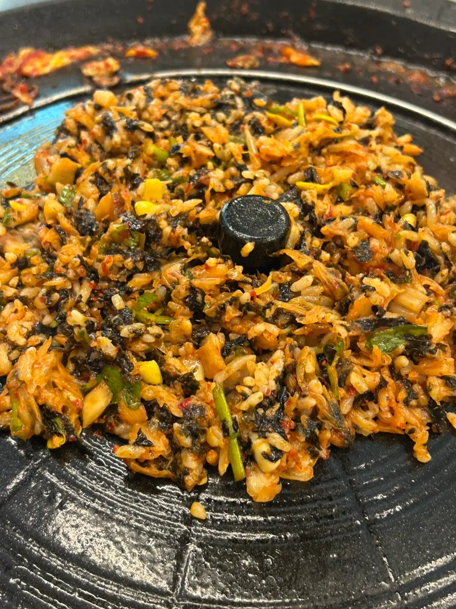 Spicy kalguksu with minari and mushrooms