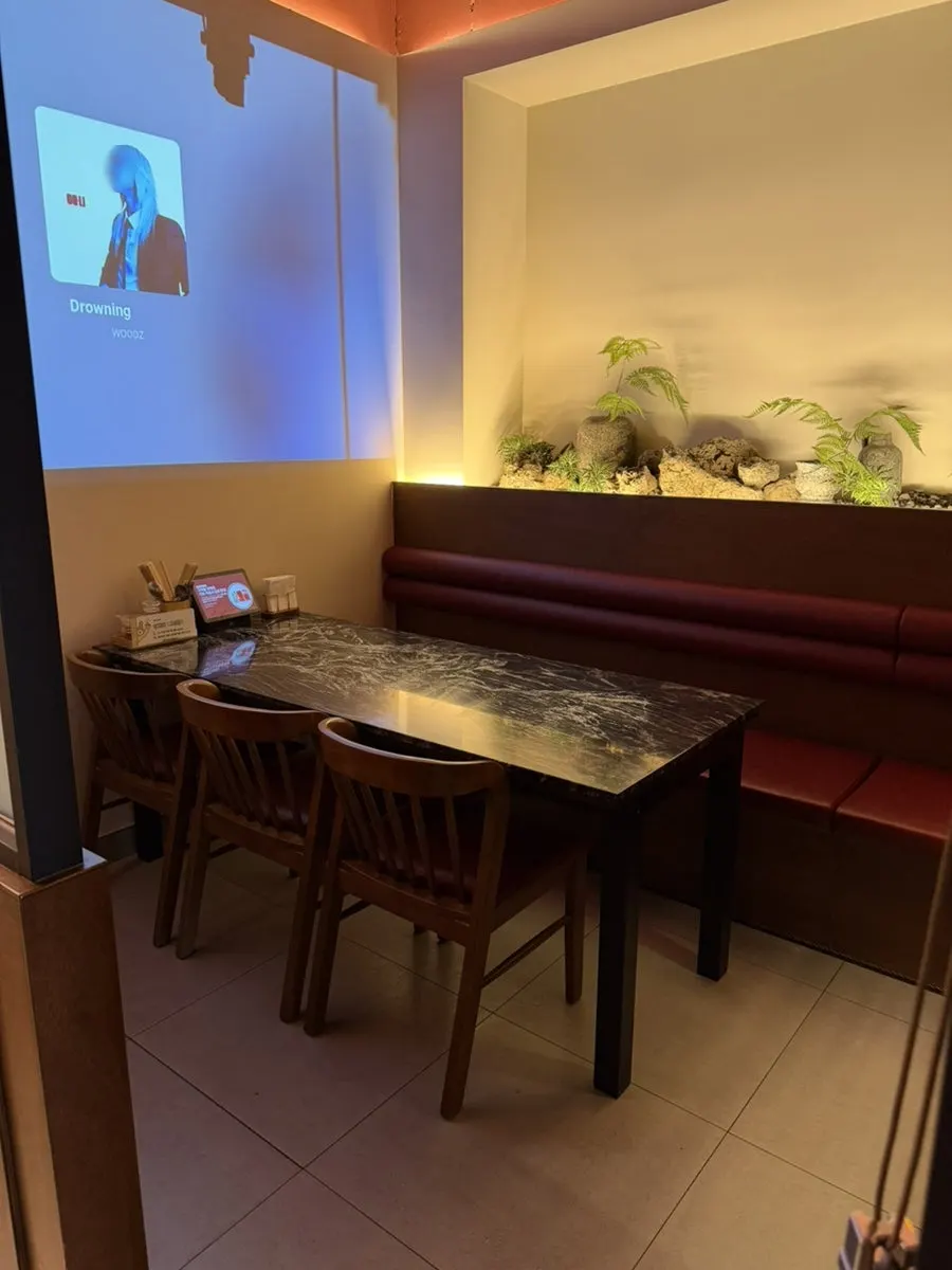 Seating inside the calm-toned Chinese restaurant