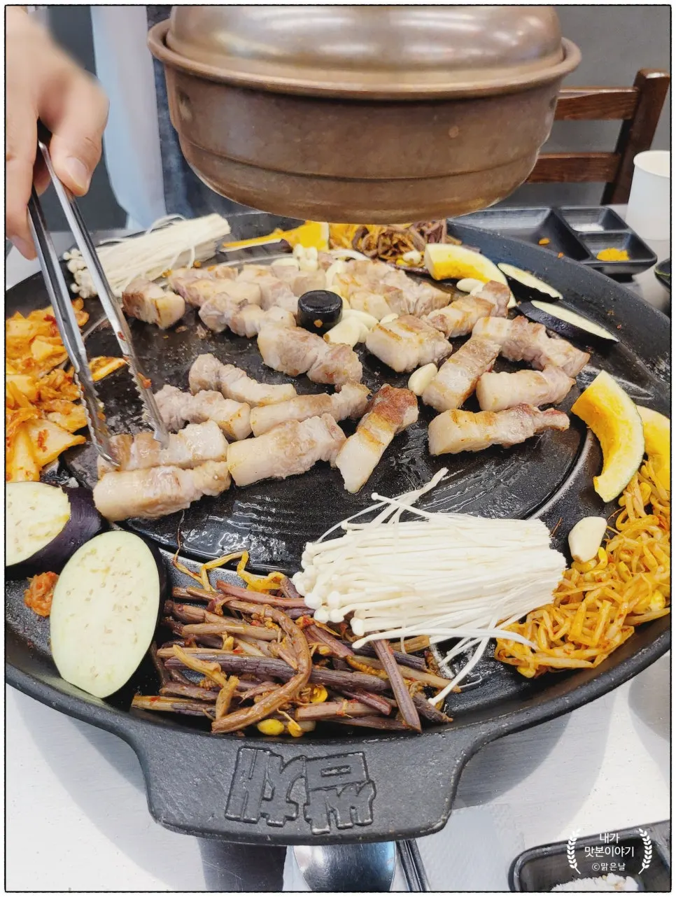 Pork belly cut into bite-sized pieces by staff