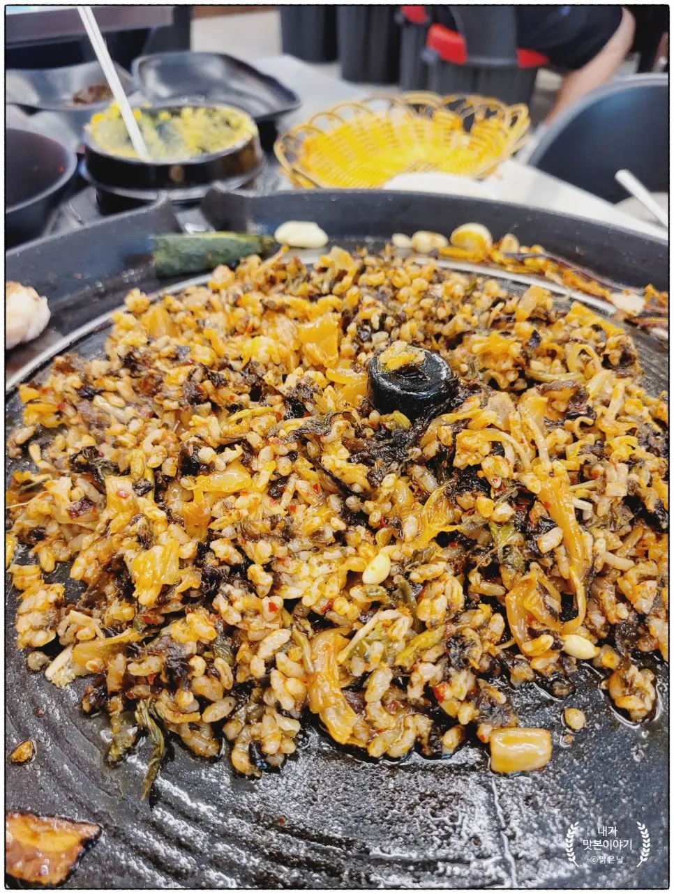 Kimchi fried rice before being placed on the iron lid