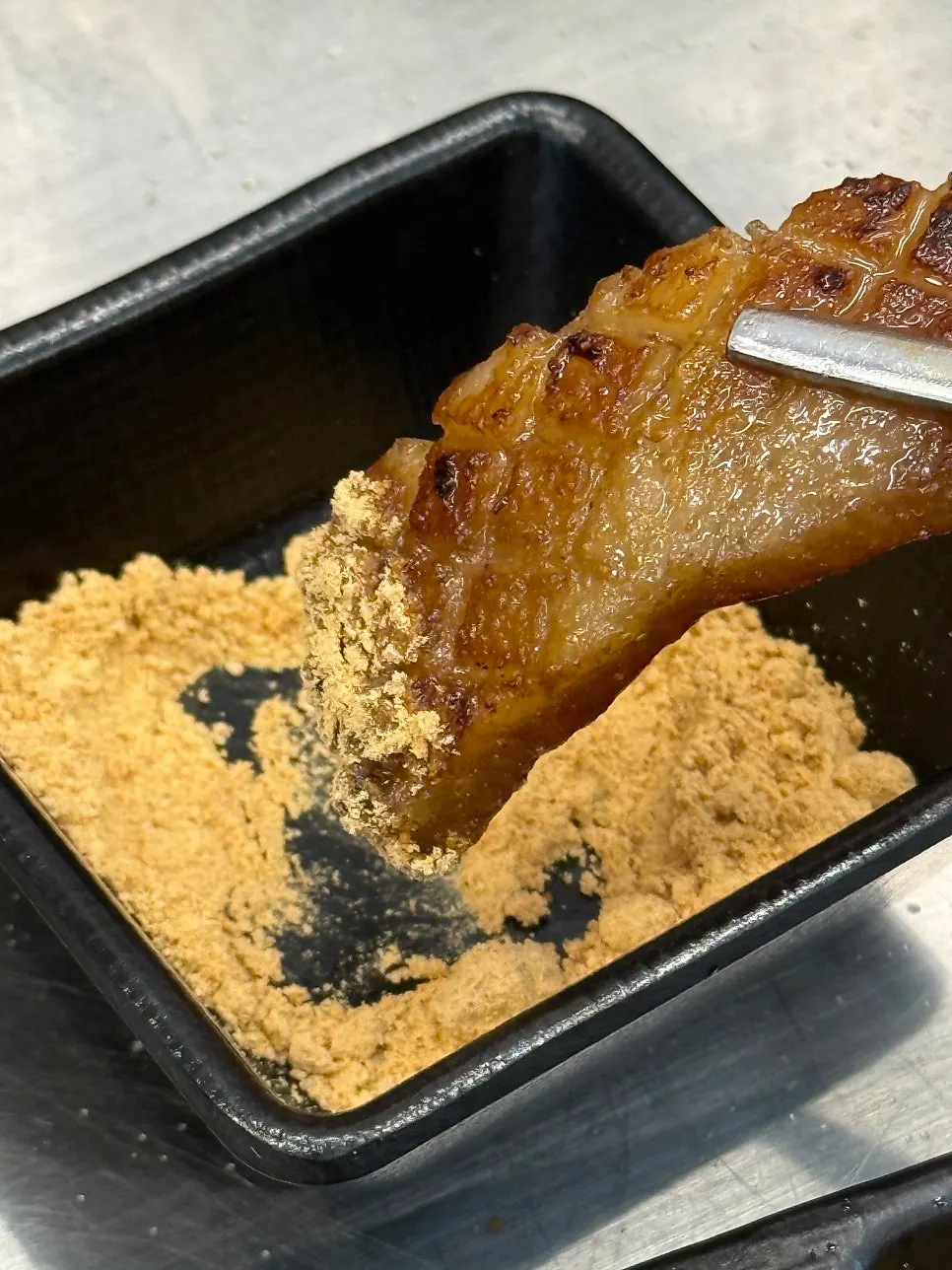 Close-up of plump, well-cooked pork skin