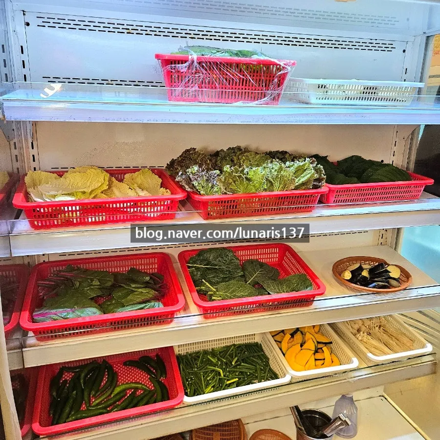 Self-serve wrap vegetable corner inside the restaurant