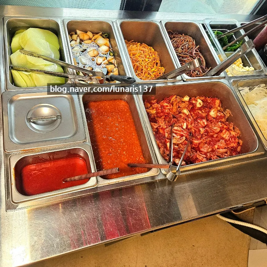 Small plates and side dishes at the entrance self-serve corner