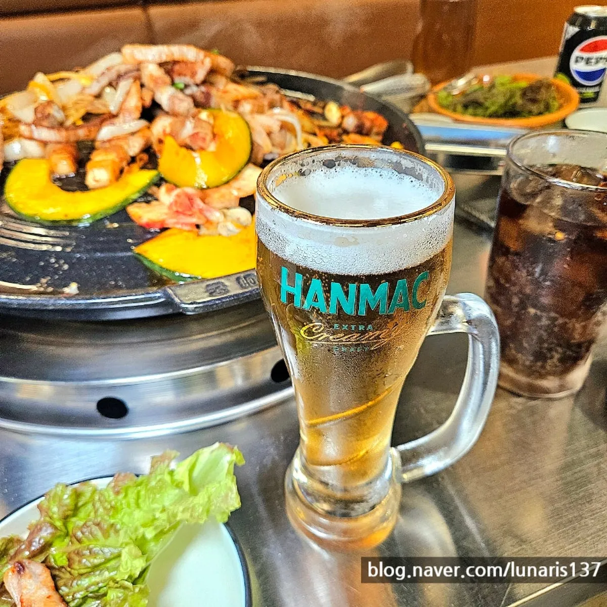A glass of draft beer enjoyed alongside the meat