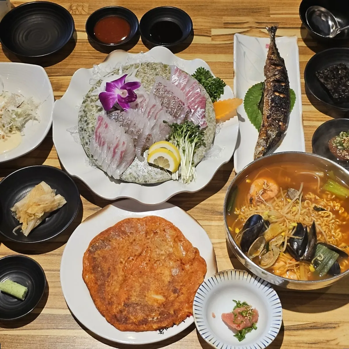 Intro to a live-fish sashimi meal in Guwol-dong
