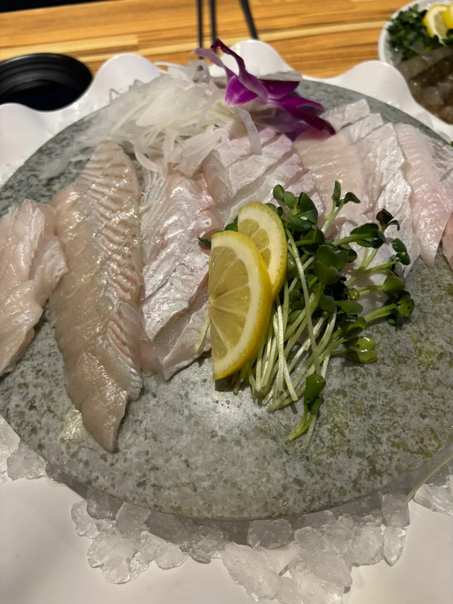 Order of flounder sashimi and mini raw shrimp sashimi