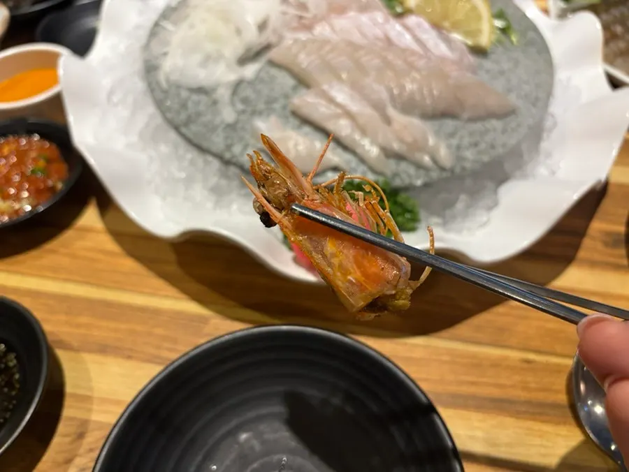 Raw shrimp sashimi ordered from aquarium shrimp