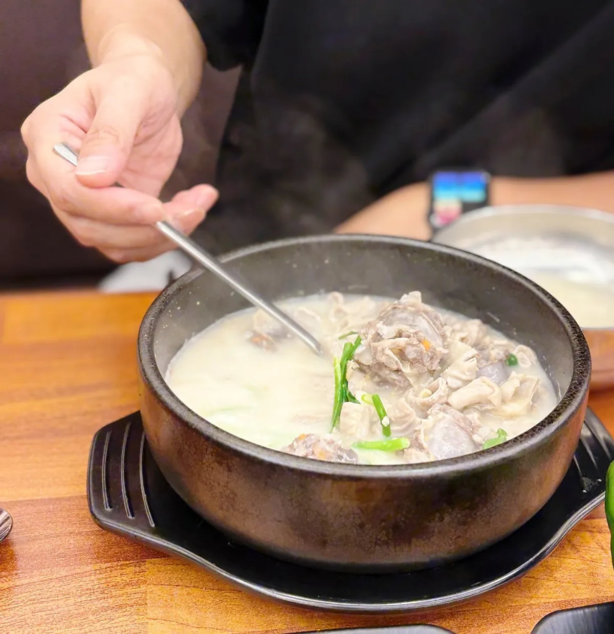 A bowl of sundae-guk in a hot stone pot at Yennal Gyeongseong Sundaeguk