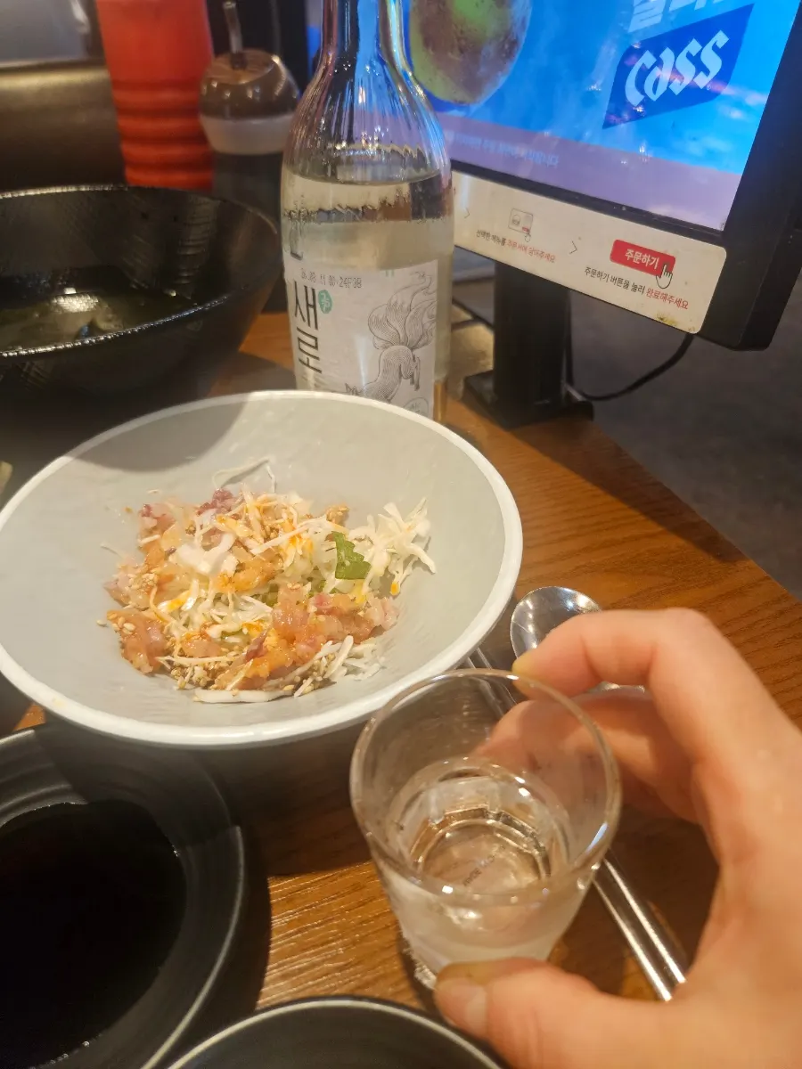 Nutty basic sashimi side dish with a glass of soju
