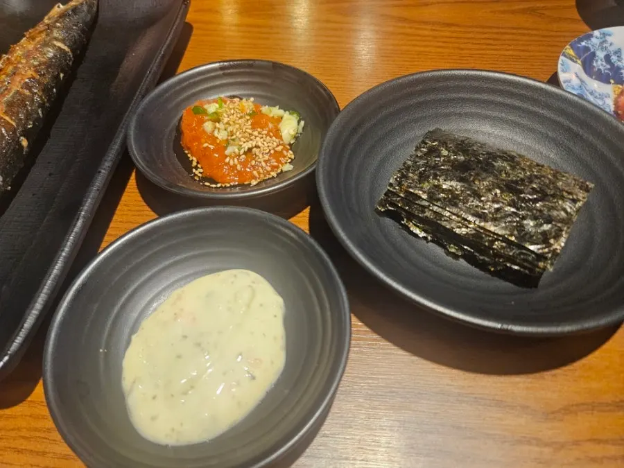 Plump grilled saury served hot