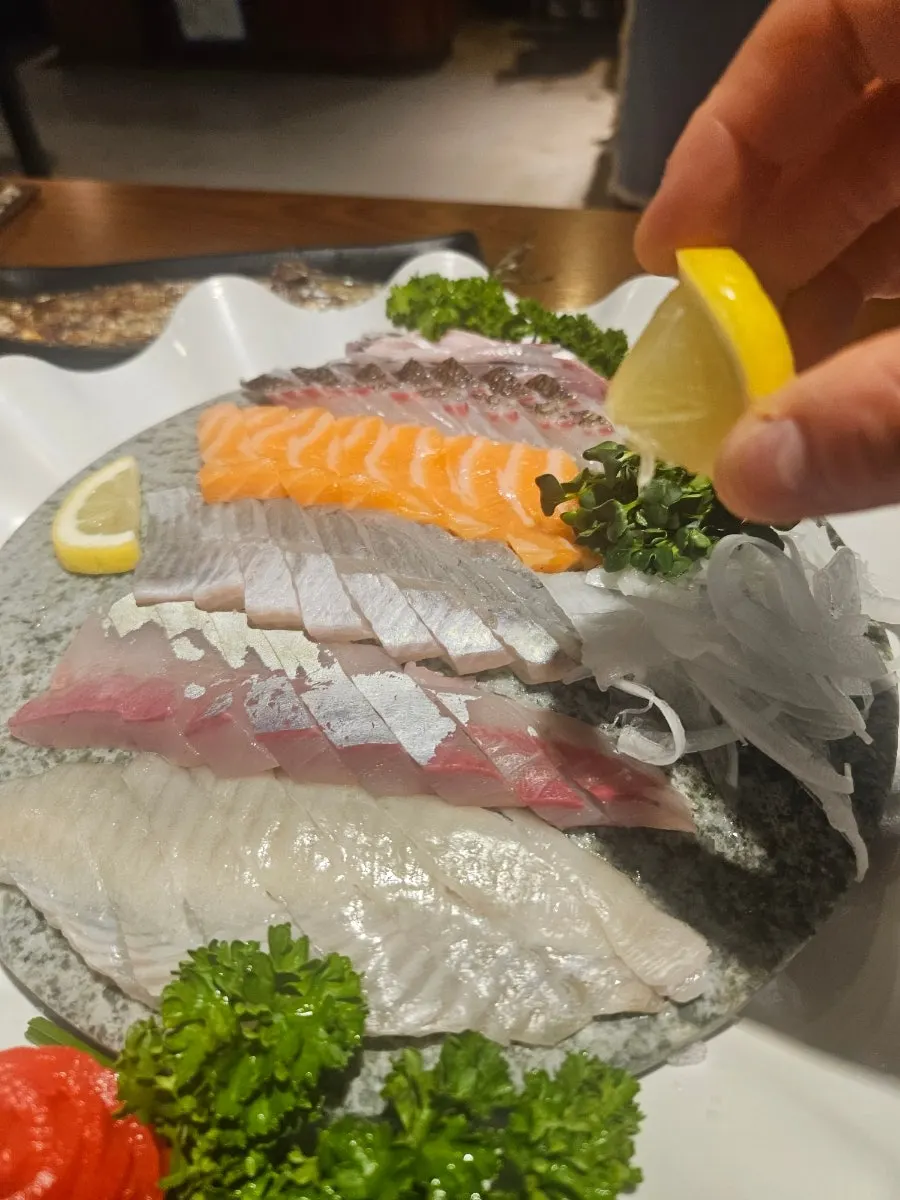 Well-aged piece of white fish sashimi
