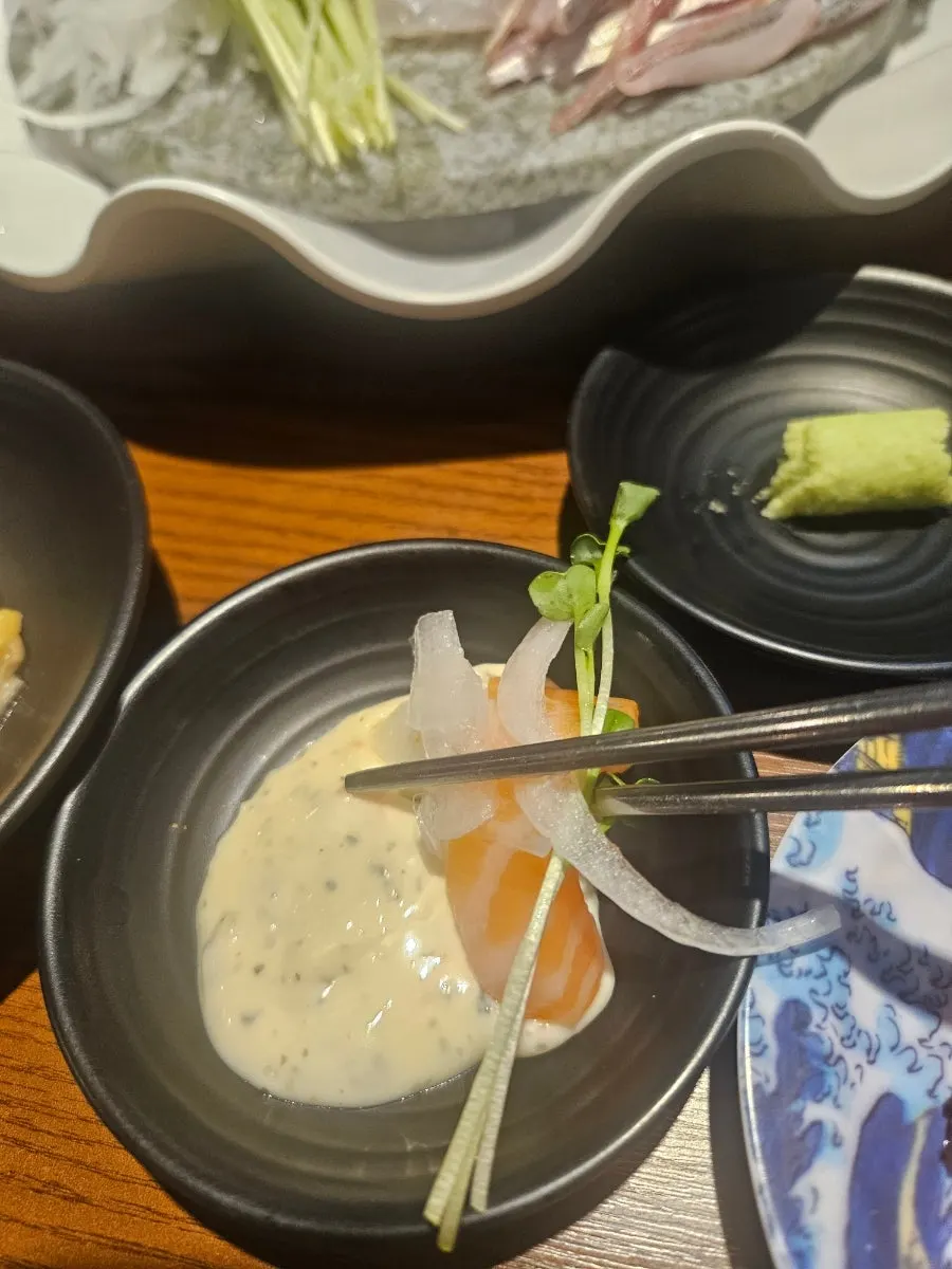 Flounder sashimi with aged kimchi and sesame oil sauce