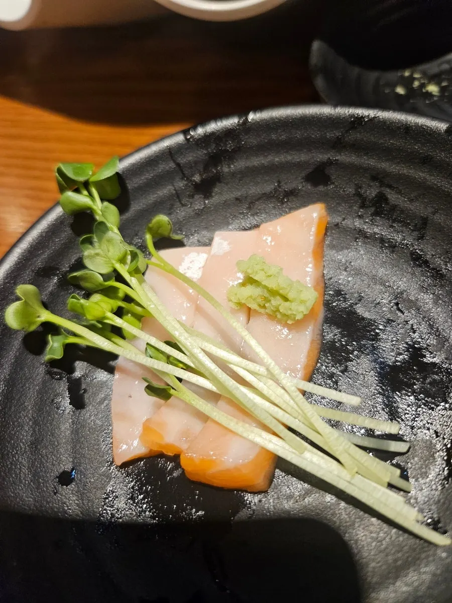 Homemade sushi with raw fish on sushi rice