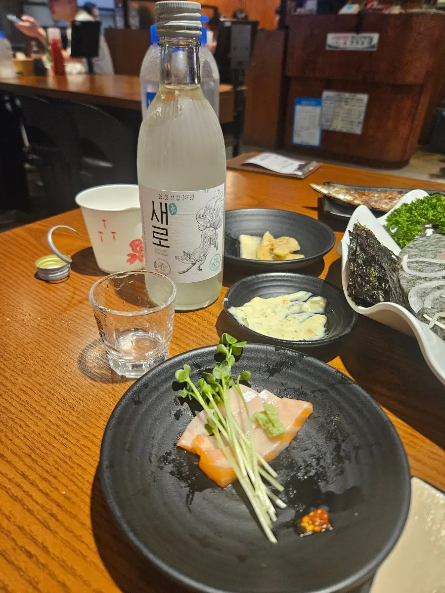 A bite-sized plate combining raw fish and sides
