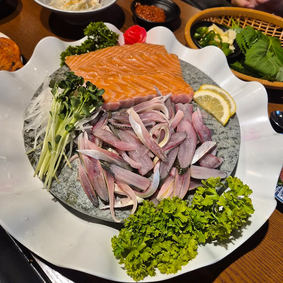 Combo sashimi spread with both gizzard shad and salmon