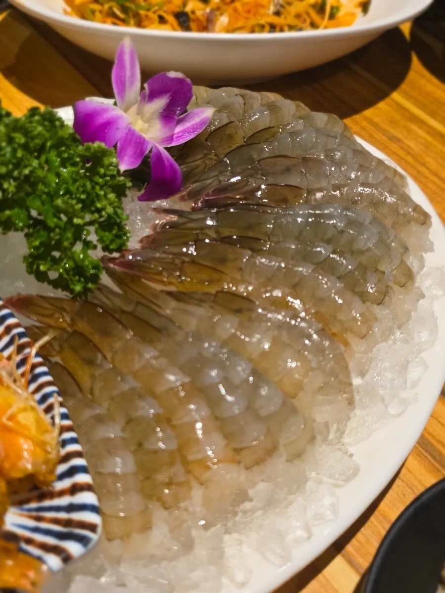 A crispy bite of butter-grilled shrimp head