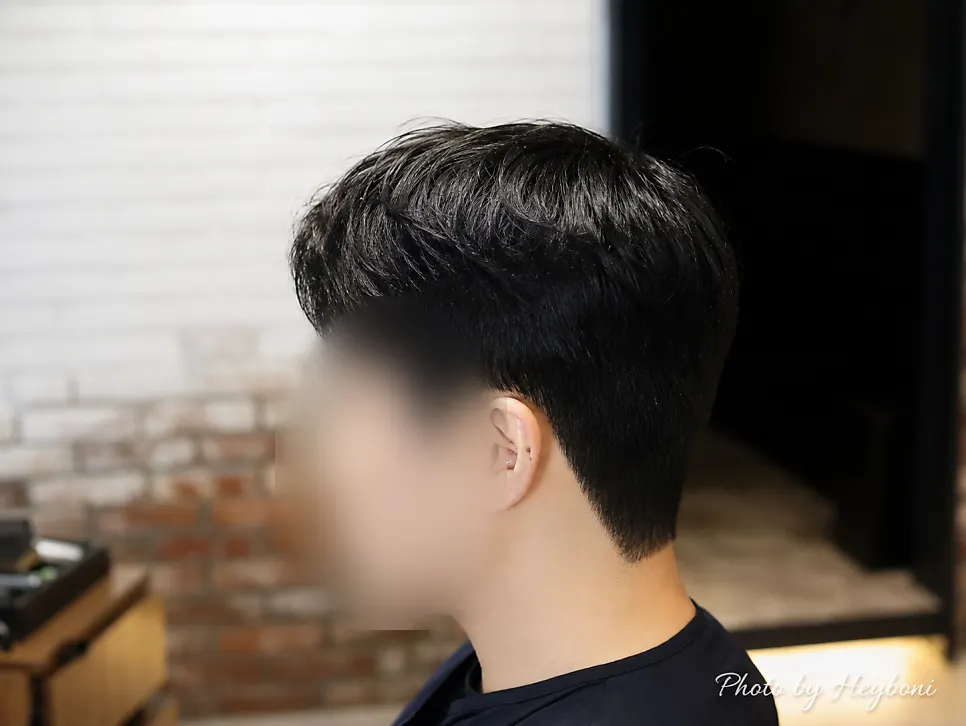 Men's hairstyle after a down perm at Juno Hair in Guwol-dong