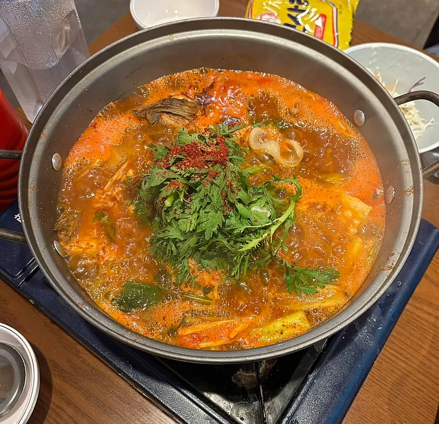 Seodari spicy fish stew bubbling on the stove