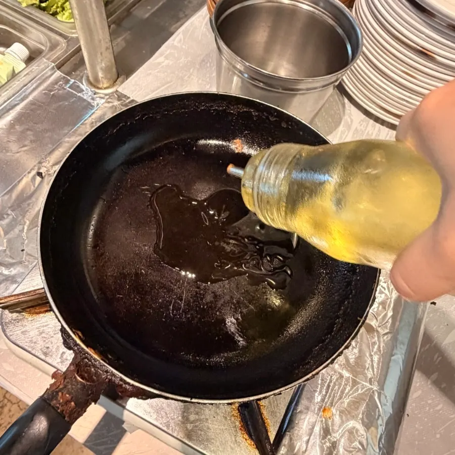 Free kimchi pajeon grilled at the table