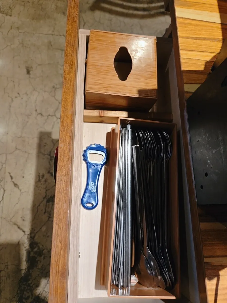 Chair with built-in storage space and table drawer