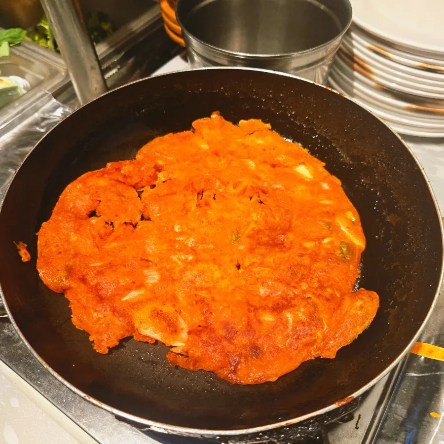 Kimchi pancake frying at the self-bar