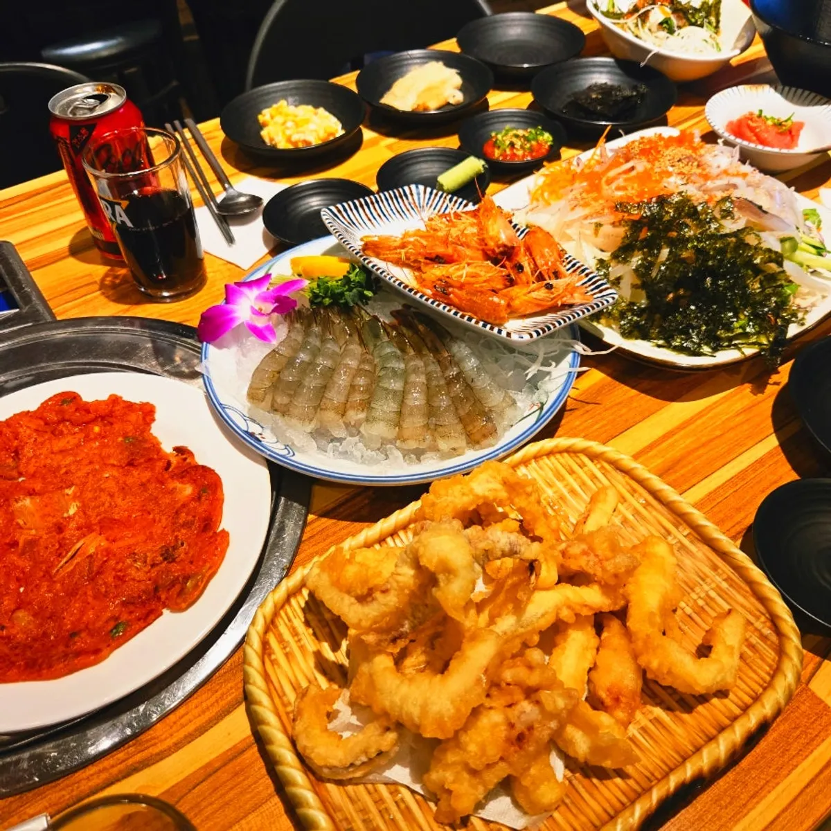 A plate of golden fried kimchi pancake