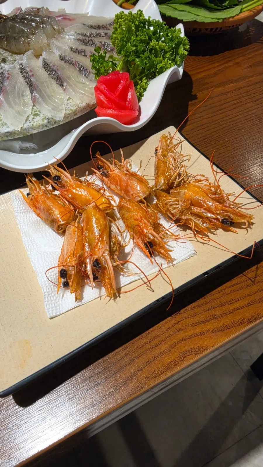 Raw shrimp sashimi wrapped in laver and white kimchi