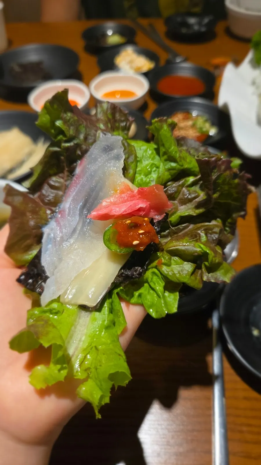 A plate of grilled shrimp heads