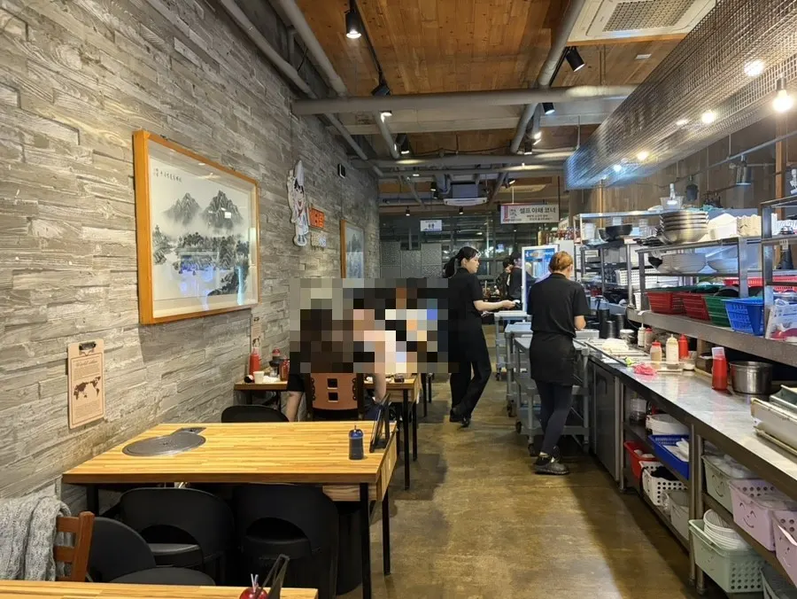 Restaurant interior packed with customers on a weekday evening