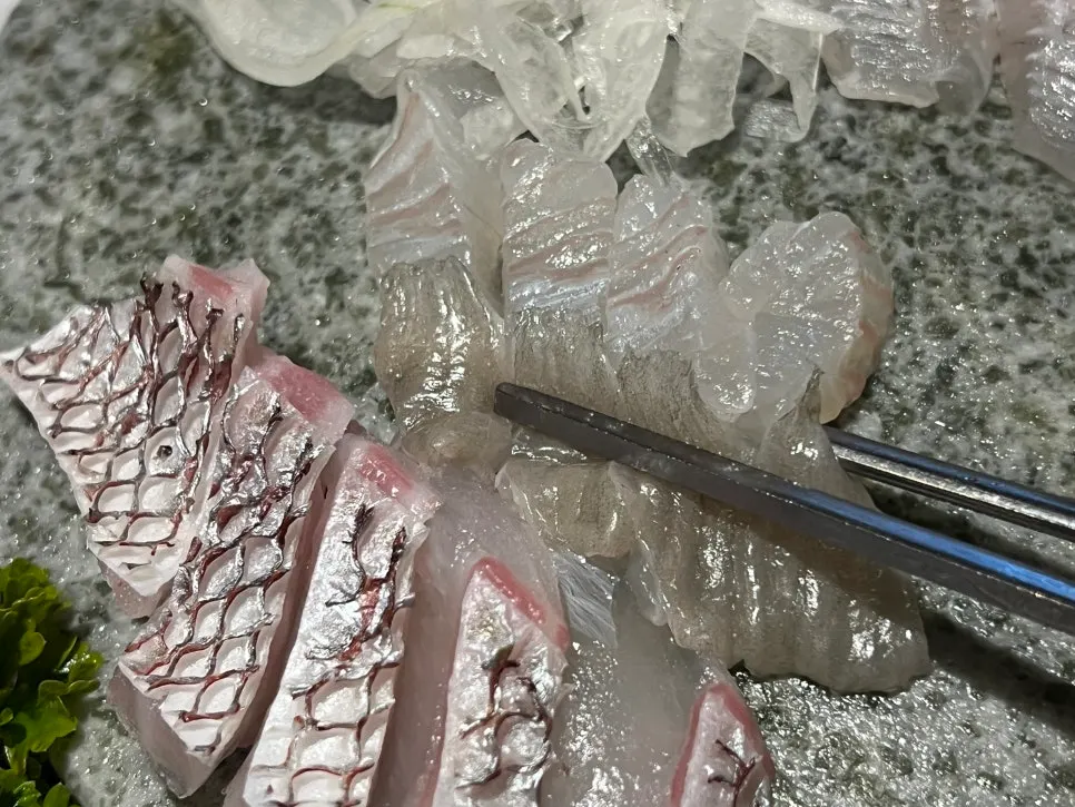Fresh raw fish enjoyed with soy sauce and perilla leaf