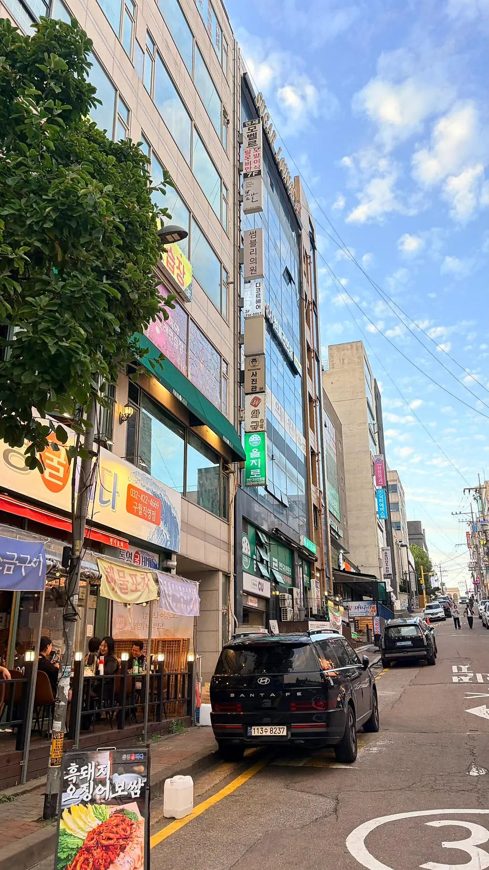 Entrance of the Guwol-dong sashimi restaurant with visible signage