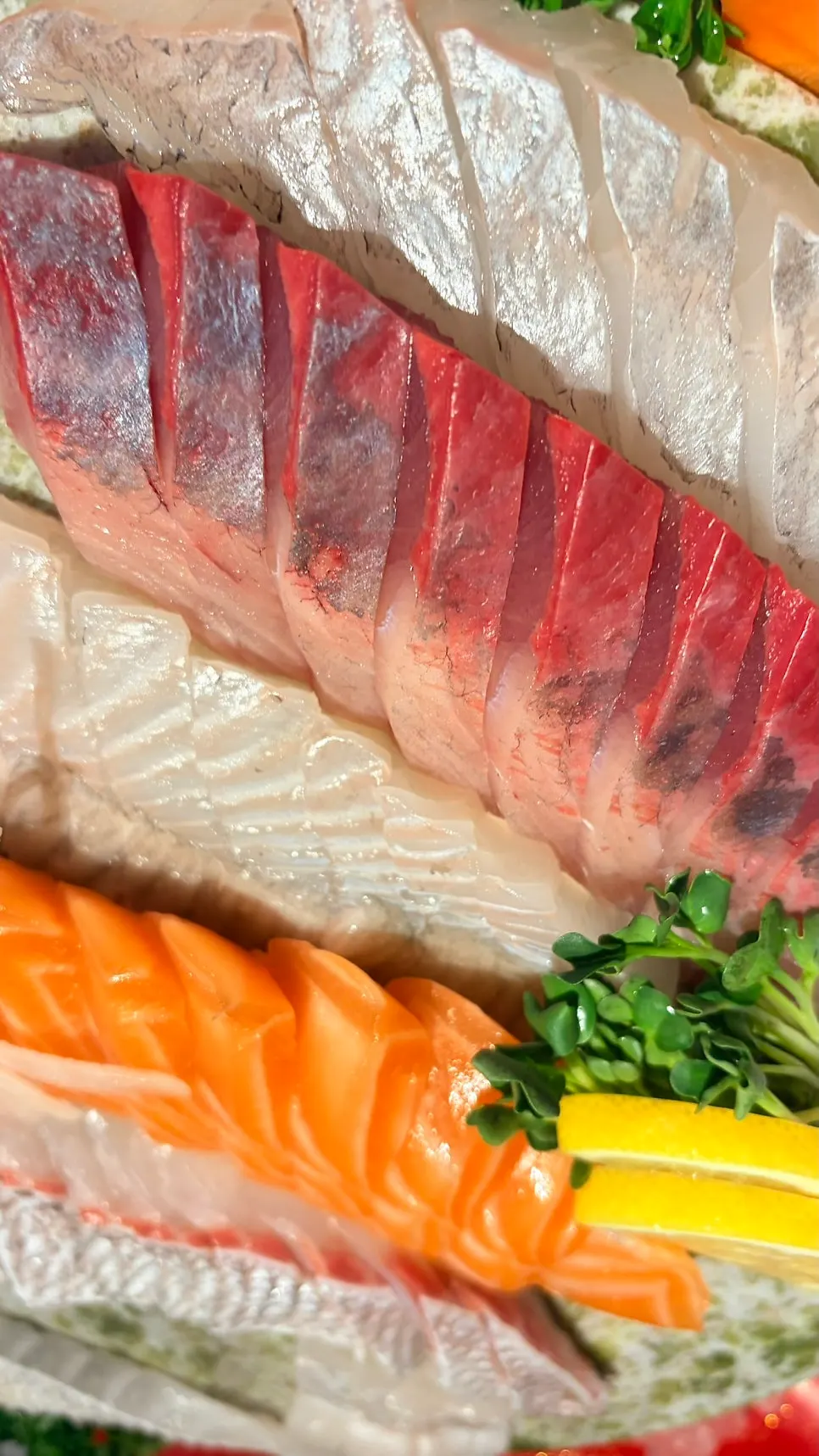 A plate of thick-cut assorted sashimi