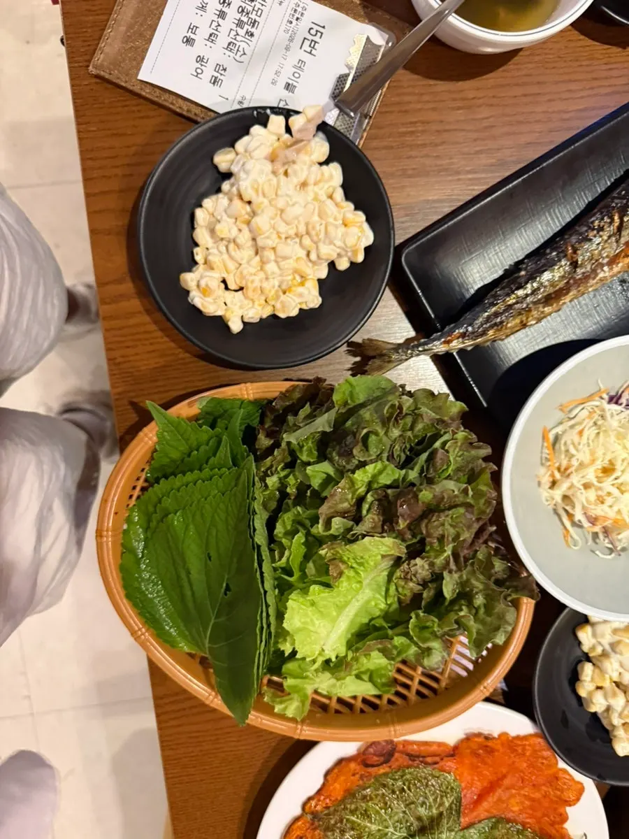 Seaweed wrap topped with flounder sashimi and cod roe