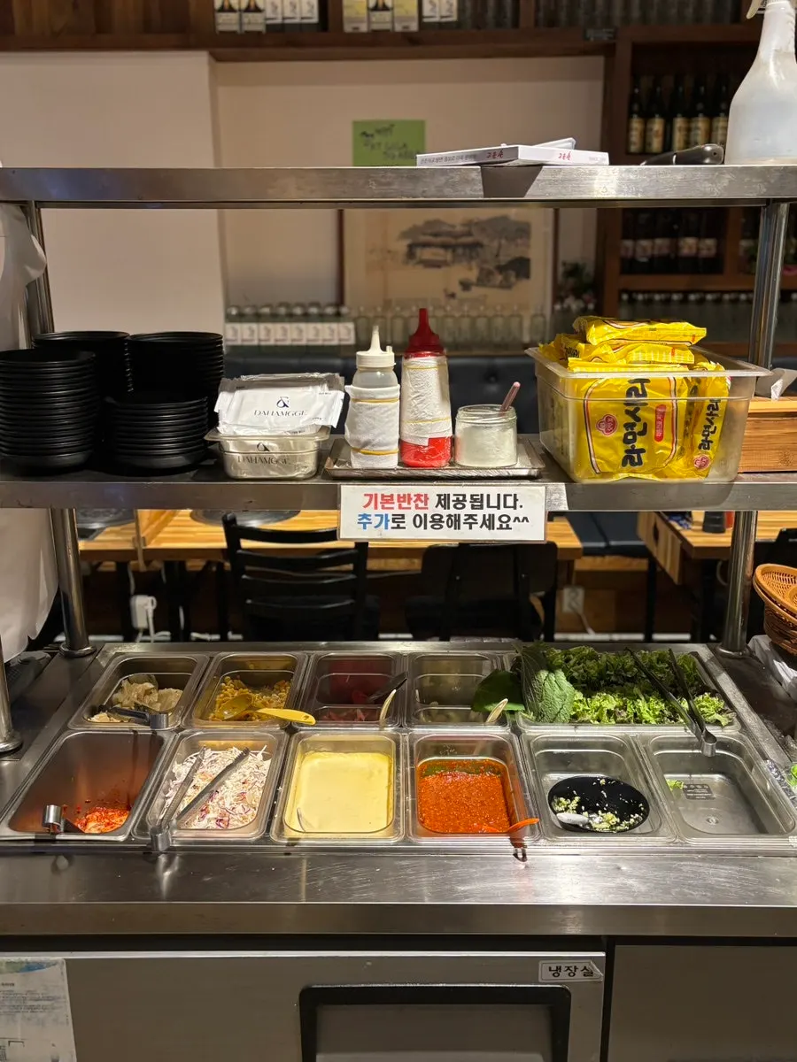 Table view of salt-grilled shrimp cooking